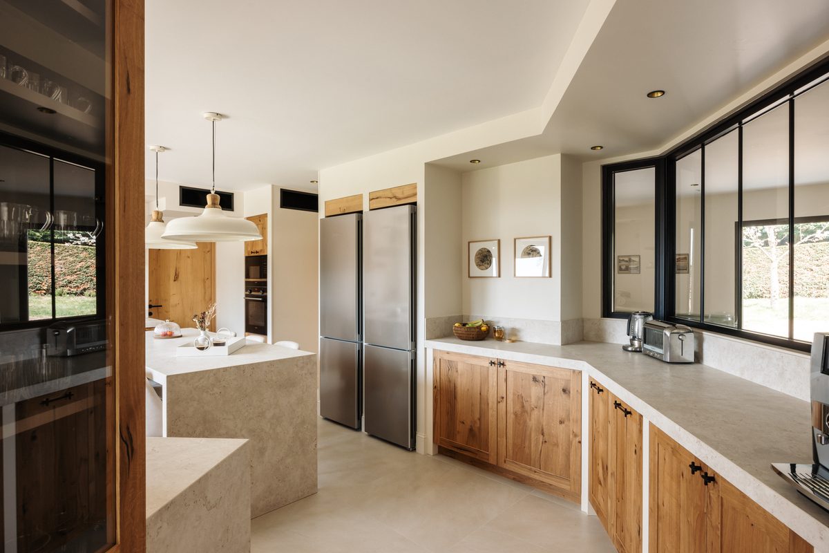 The villa's fully equipped kitchen: worktops, ovens and coffee machine