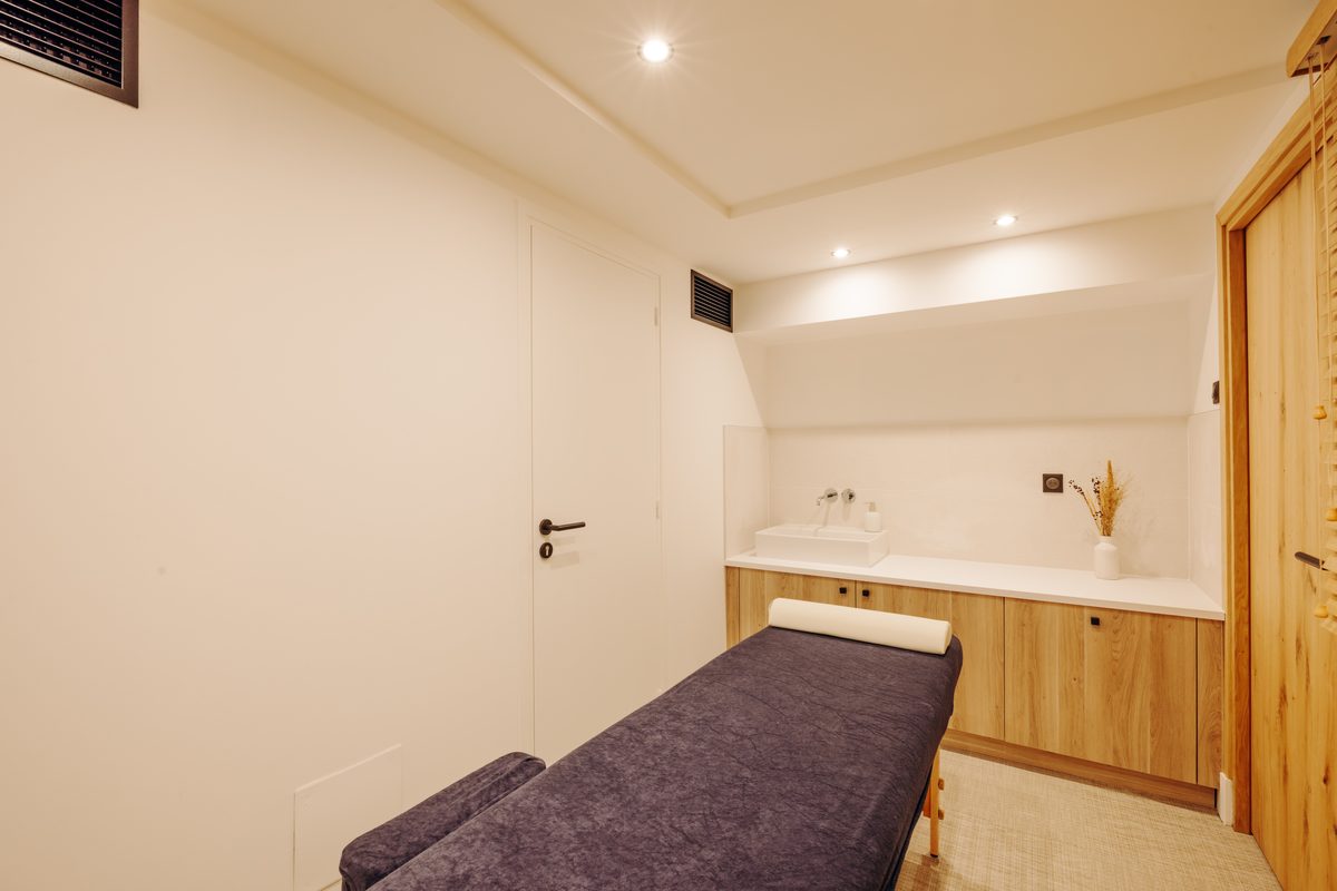 The Holisty villa's massage room with its treatment table, for in-villa treatments