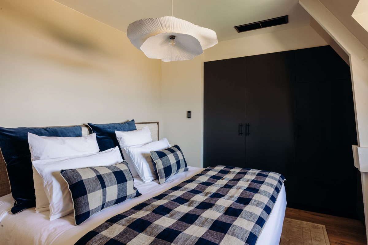 Suite 3, king-size bed and bedside table
